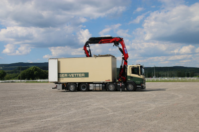 Kran mit Open-Top Container für heikle Güter